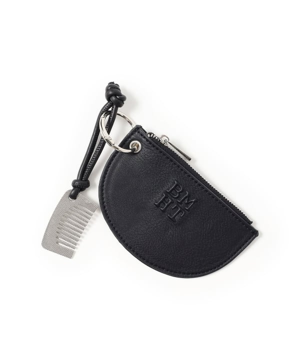 Pouch & comb charm: Stylish semi-circular shape and embossed logo.